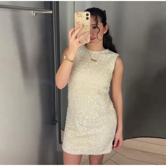 Raquel - Sequin dress with bow