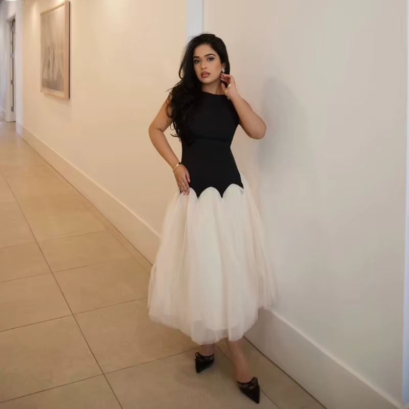 Tindra - Elegant tule midi dress