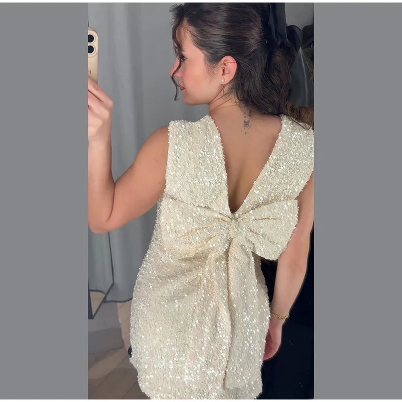 Raquel - Sequin dress with bow
