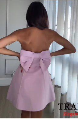 Thessaly - Strapless mini dress with bow