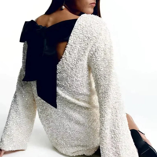 Siona - Sequin dress with bow