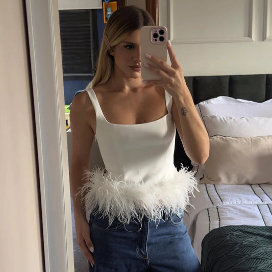 Yara - Elegant top with feather detail