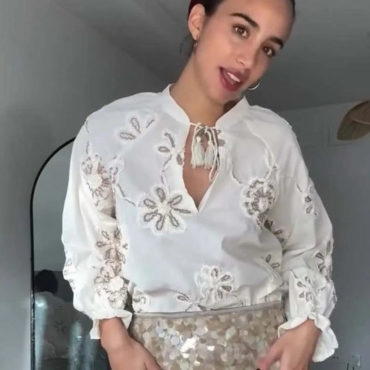 Elli - Cotton blouse with flower details
