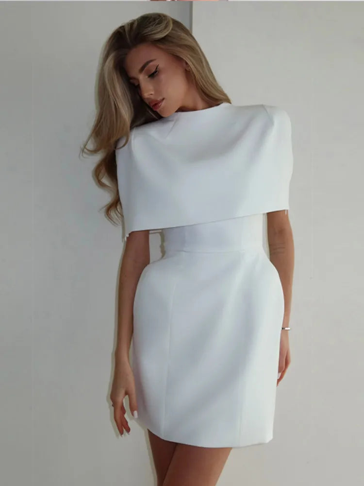 Vivica - Structured mini dress with cape