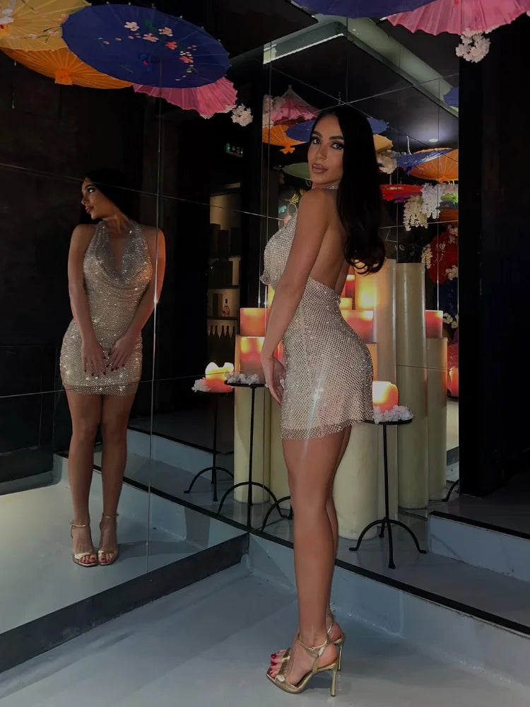 Nore - Sparkling halterneck mini dress